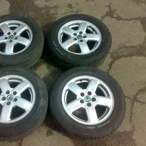 Продам оригинальные легкосплавные диски с резиной 195/65 R15 на Skoda 